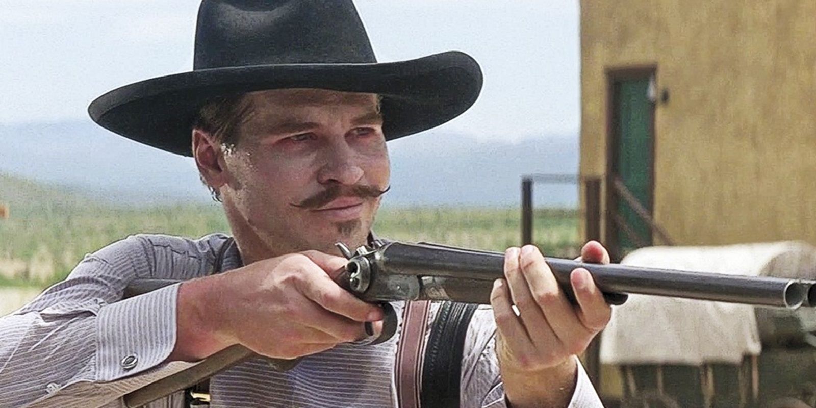 Val Kilmer with a rifle in Tombstone
