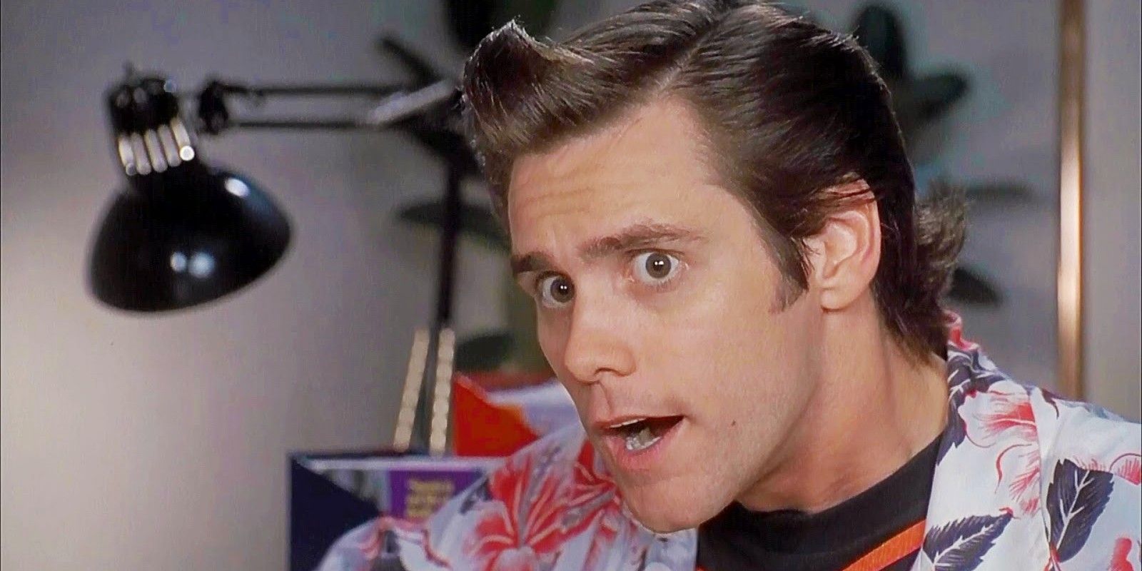 Jim Carrey looking surprise in Ace Ventura: Pet Detective