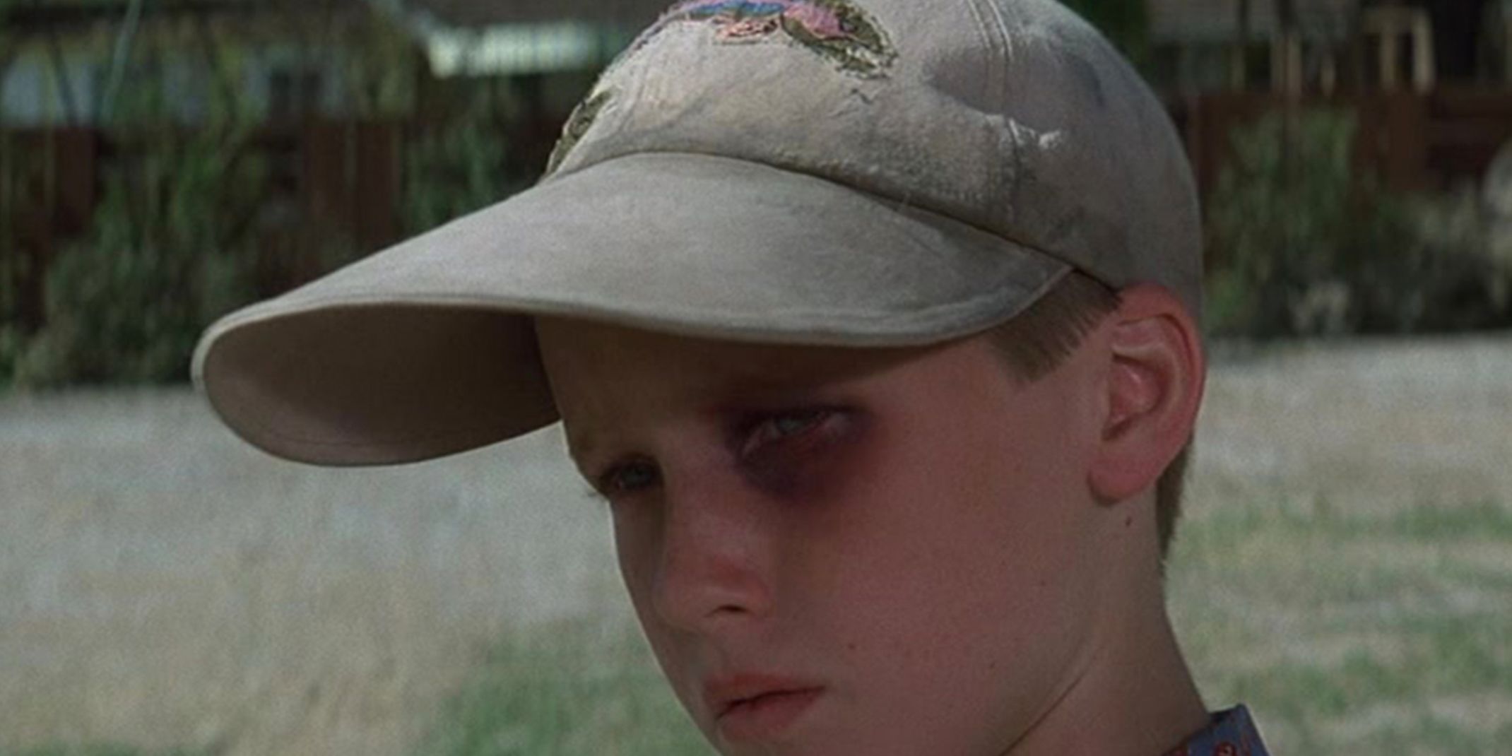 A closeup of Smalls in his fishing hat in The Sandlot