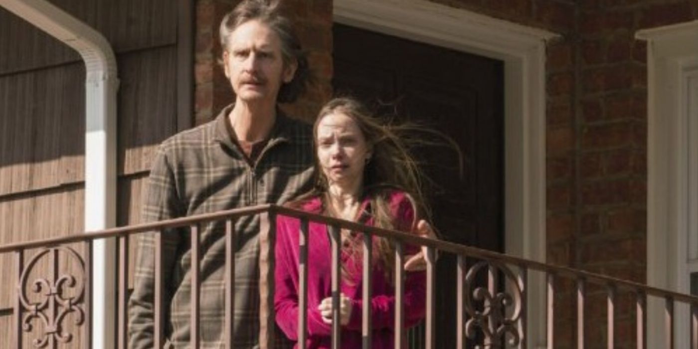 A man and woman stand on a balcony looking distressed ion Law & Order: SVU The Book Of Esther.