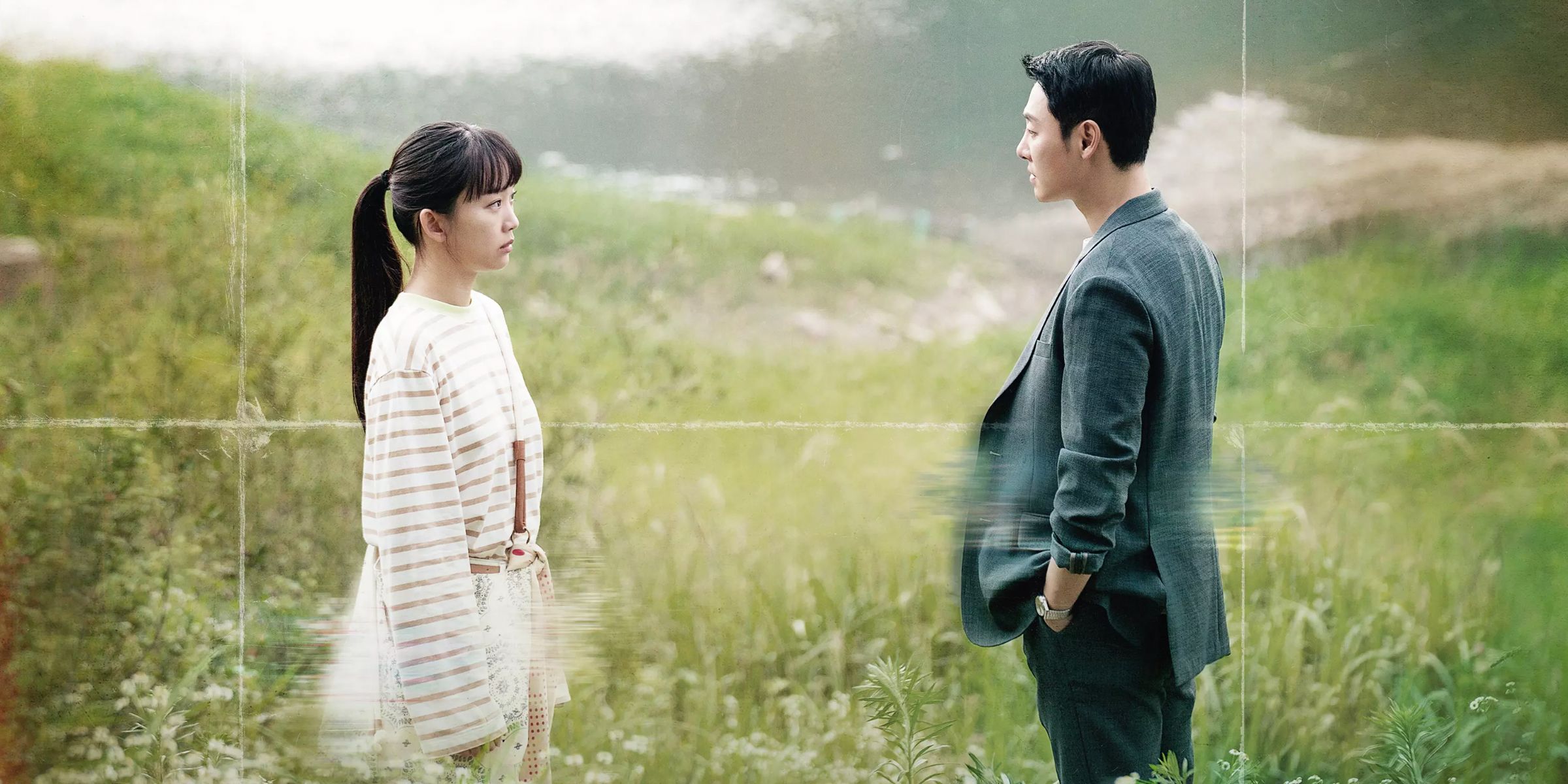 A woman and a man stand in the middle of a field in an old folded photograph in the time travel Kdrama series My Perfect Stranger