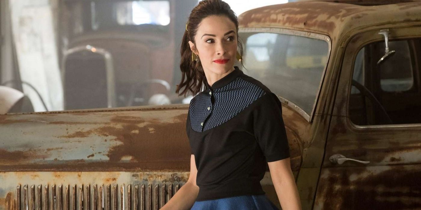 Abigail Spencer smiling and looking back in Timeless.