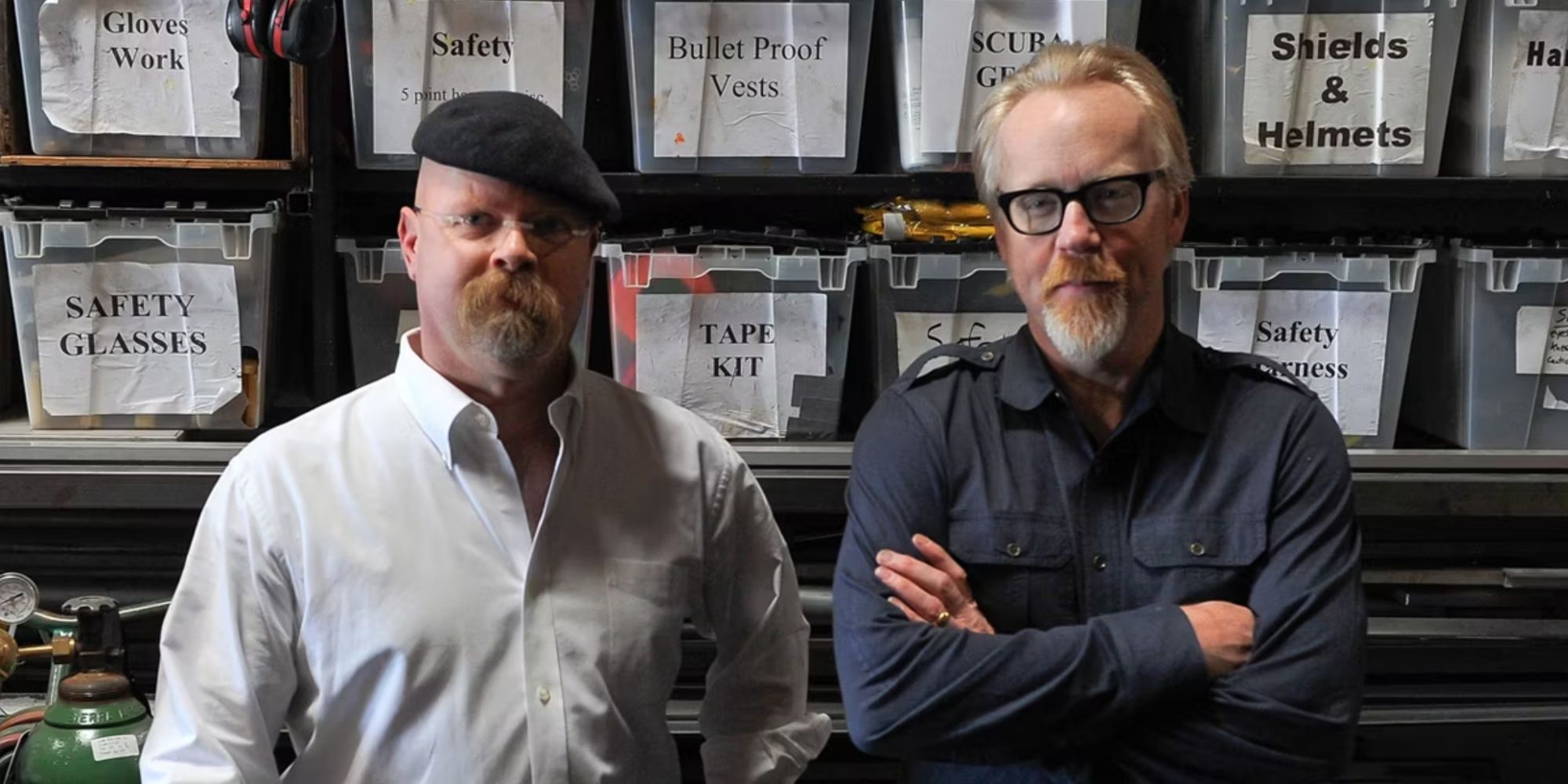 Adam and Jamie stand in front of boxes on Mythbusters