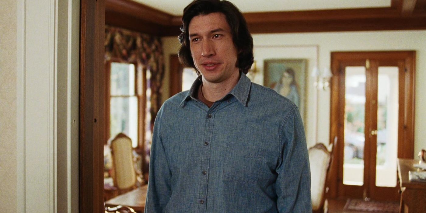 Adam Driver as Charlie Barber standing at the entrance to the room in Marriage Story