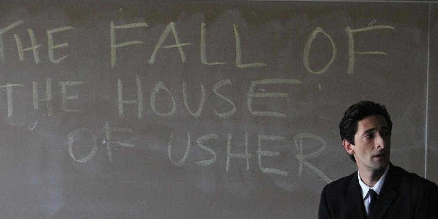 Adrien Brody standing in front of a chalkboard that says Fall of the House of Usher in Detachment.