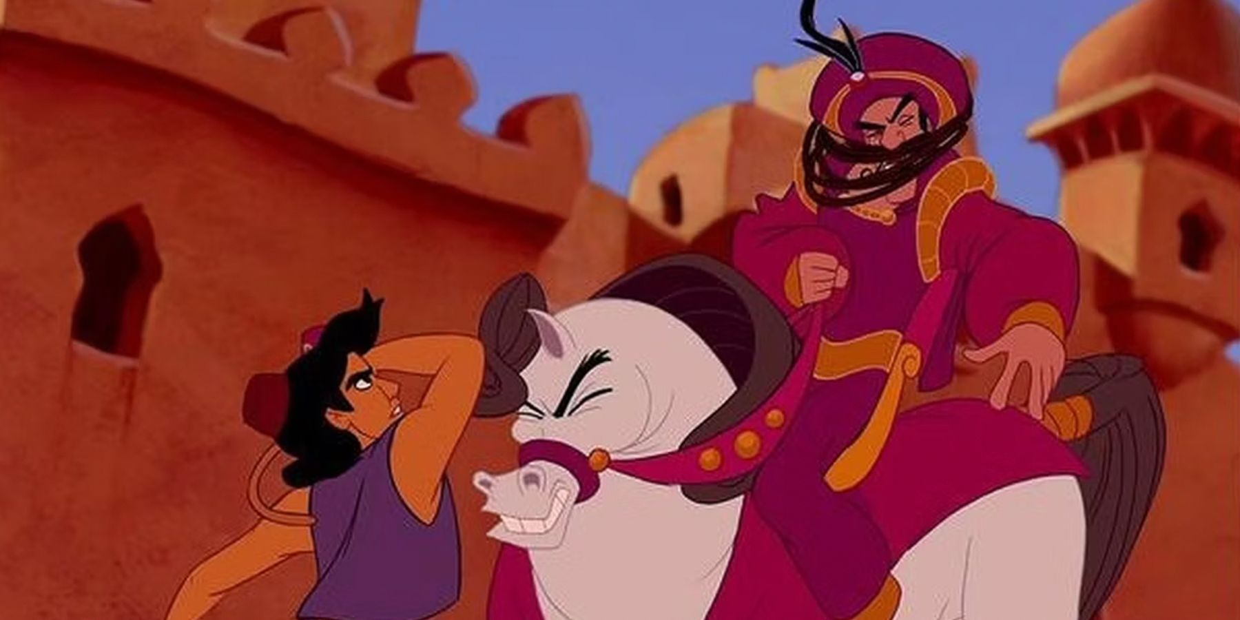 Aladdin throwing something at a guard in the animated movie