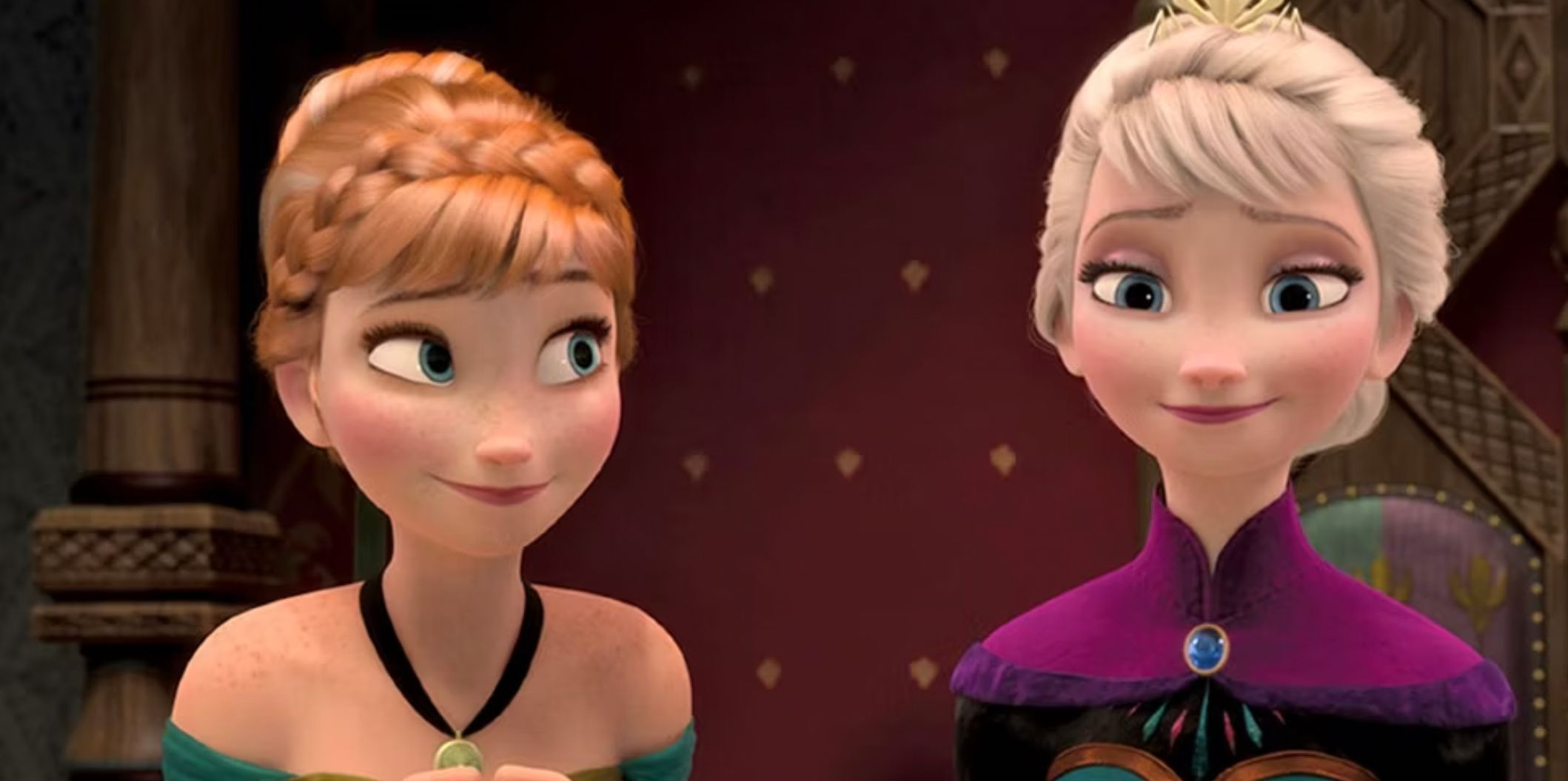 Anna smiles at Elsa in Frozen