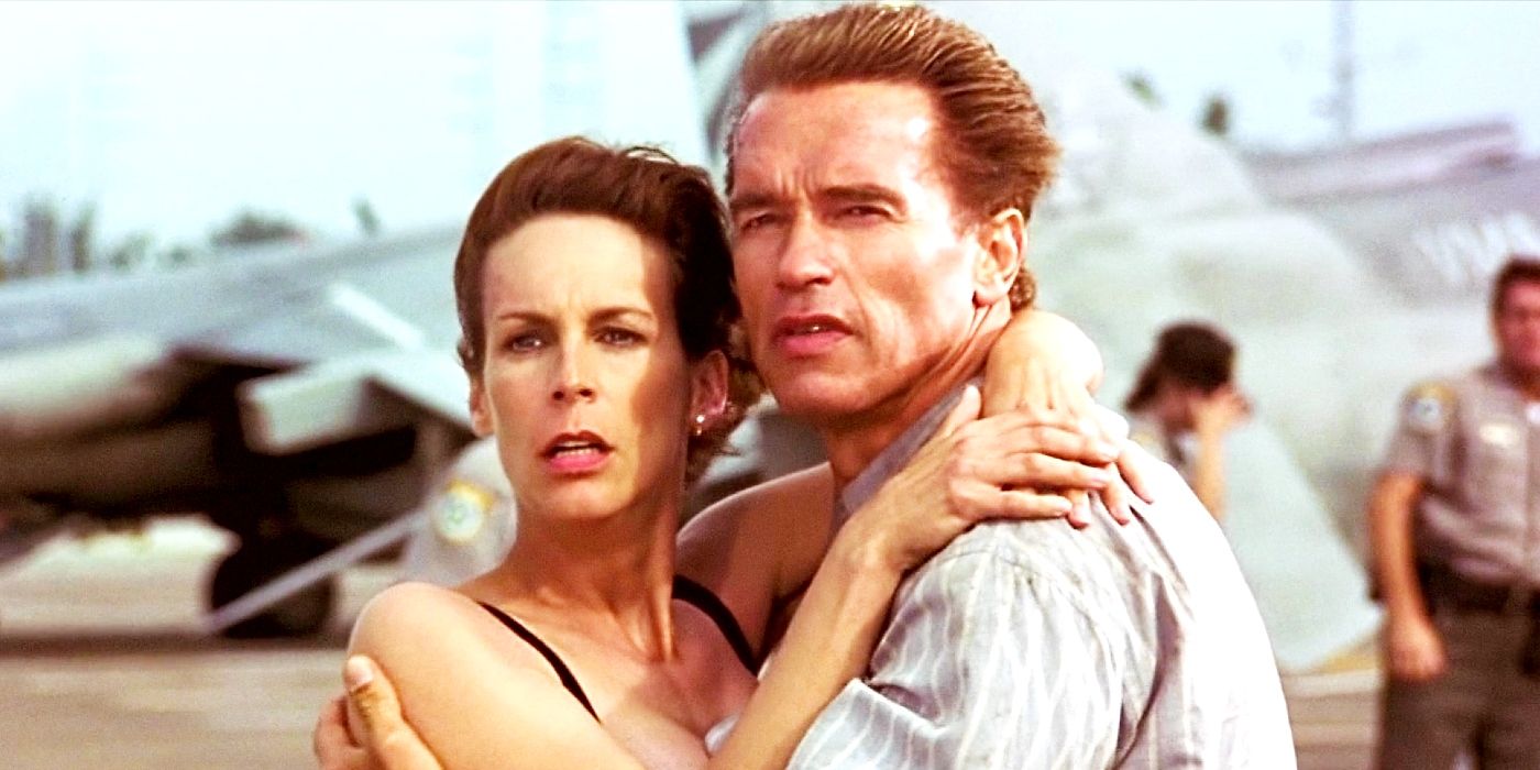 Harry (Arnold Schwarzenegger) and Helen (Jamie Lee Curtis) embrace in True Lies.