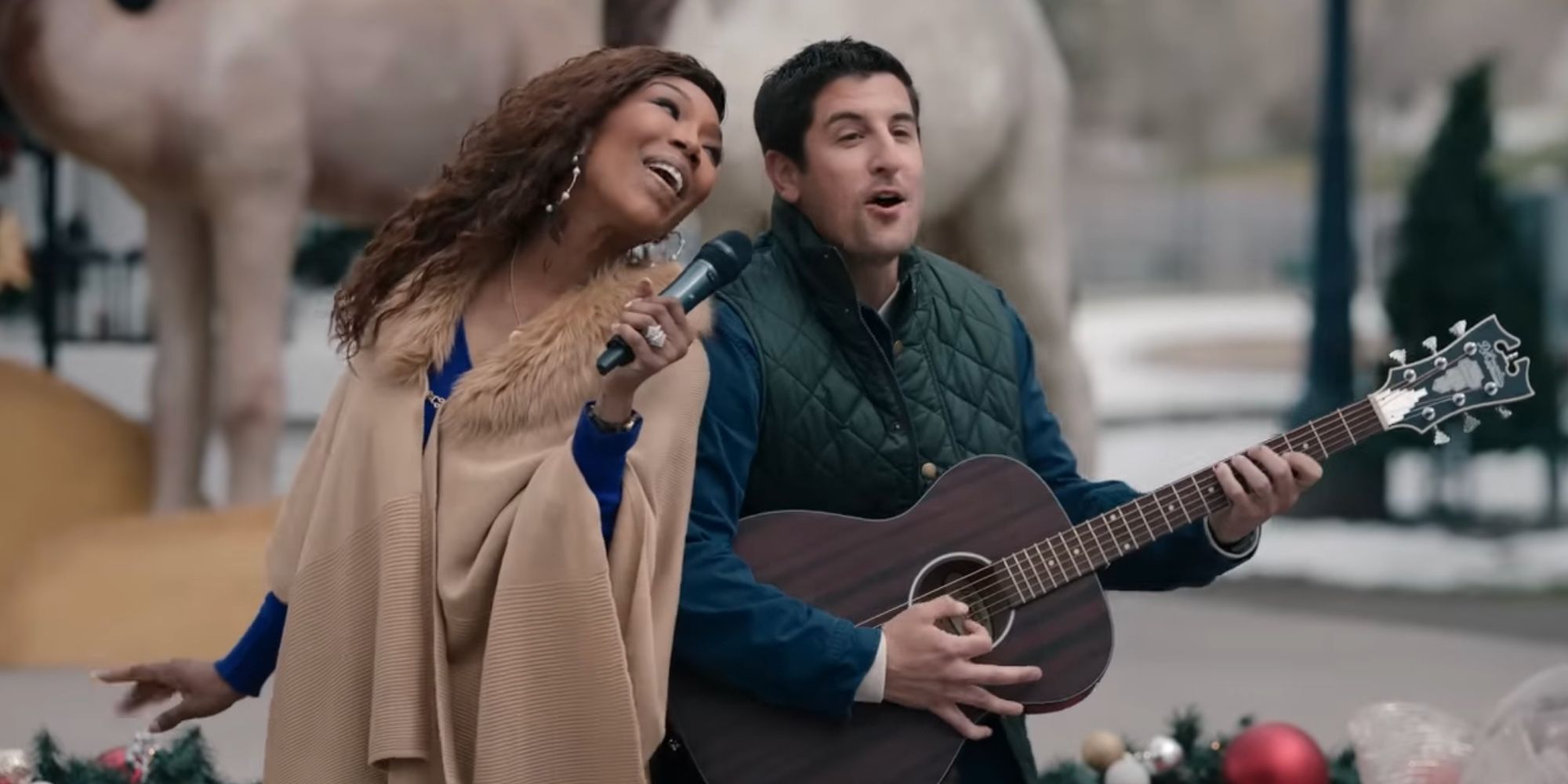 Brandy Norwood and Jason Biggs playing guitar and singing in Best. Christmas. Ever!
