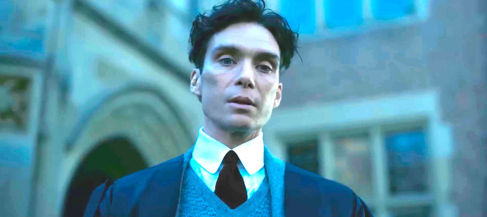 Cillian Murphy looking downward as if stricken with emotion in Oppenheimer
