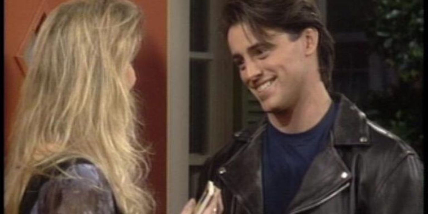 Matt LeBlanc smiling at Kelly in Married with Children