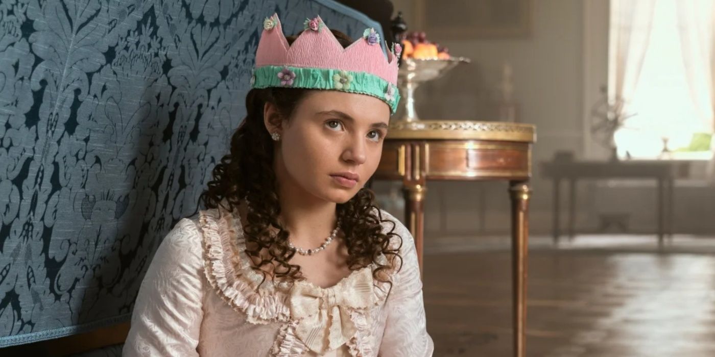 Connie Jenkins-Greig as Young Violet wearing a crown that she made in Queen Charlotte