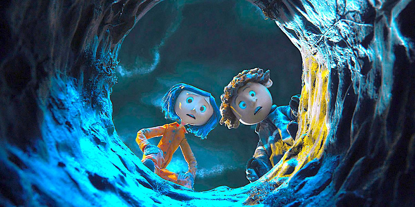Coraline and Wybie starring down a hole