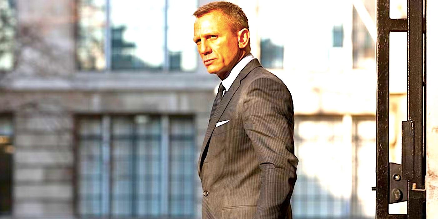 Daniel Craig's James Bond staring at the camera while wearing a grey suit