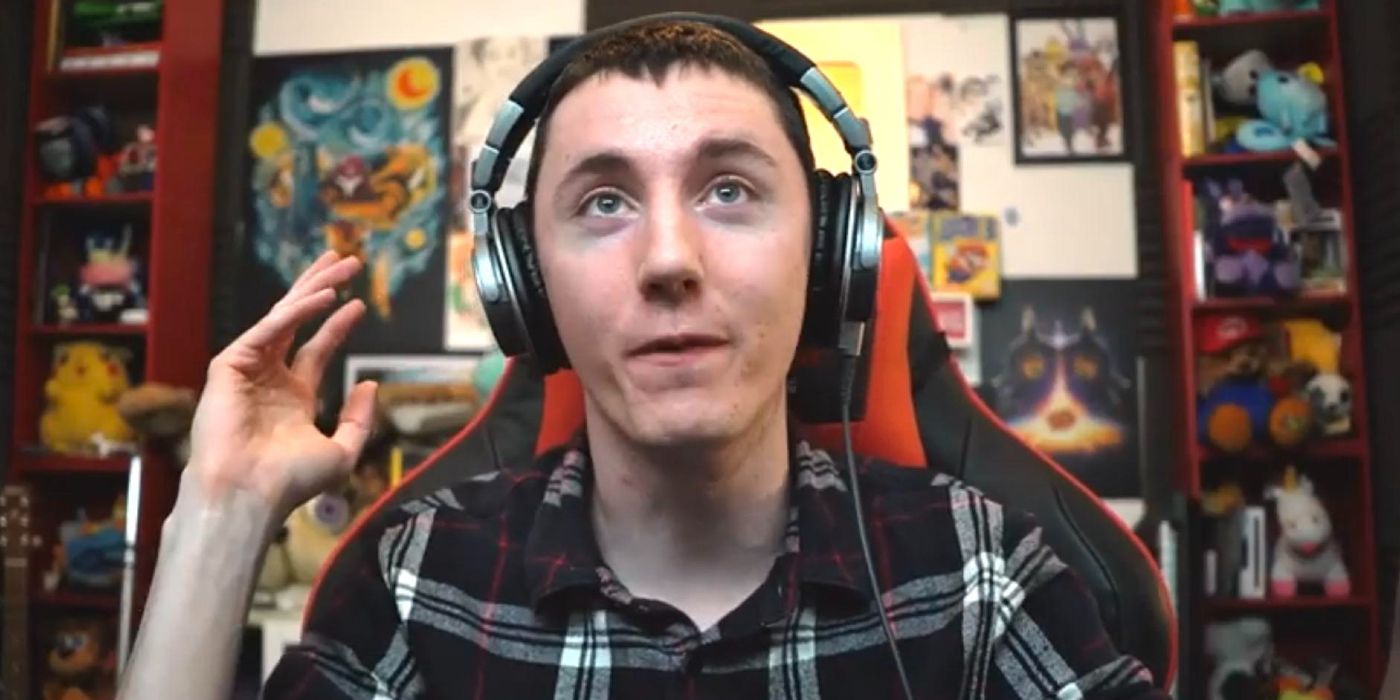 Dawko with a headset in his gaming set-up