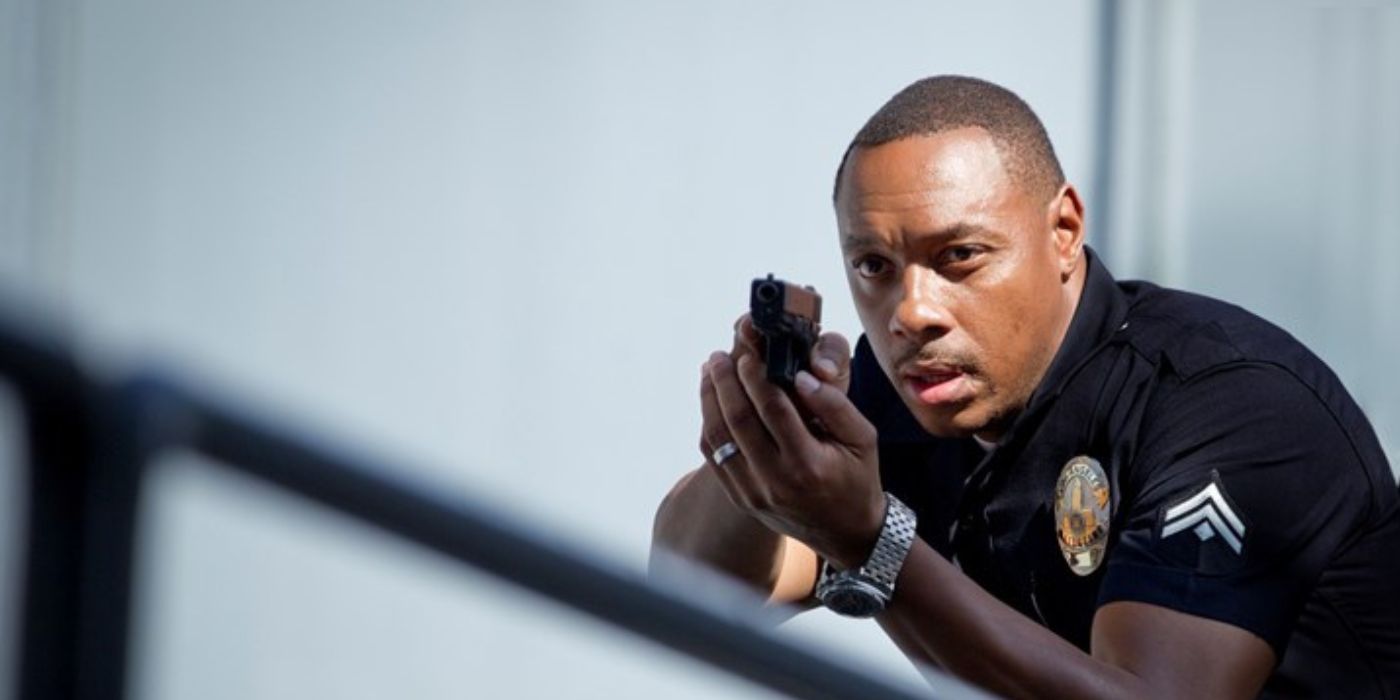 Dorian Missick holding a gun