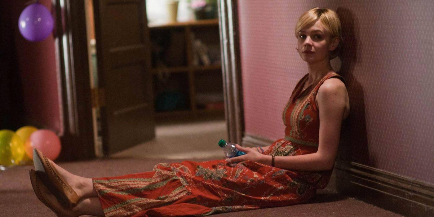 Carey Mulligan sitting on the floor in Drive