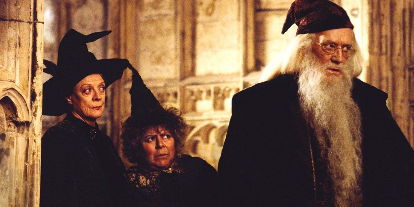 Dumbledore standing with McGonagall and Pomfrey