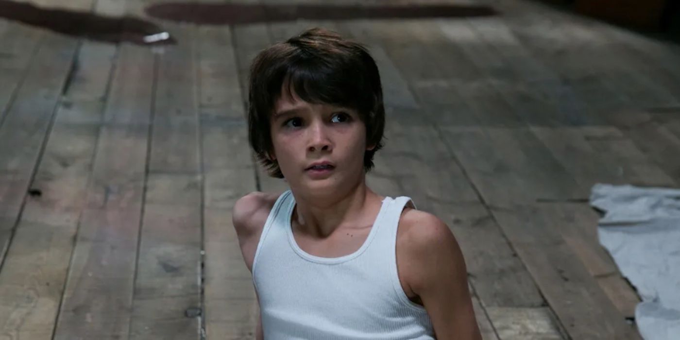 Dylan stares up from the floor in Sinister 2