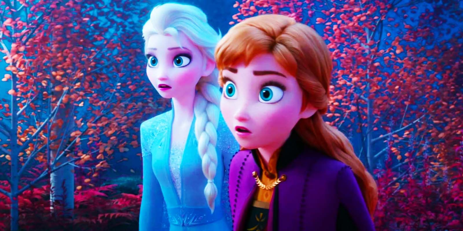 Elsa and Anna look off to the side shocked in Frozen II.