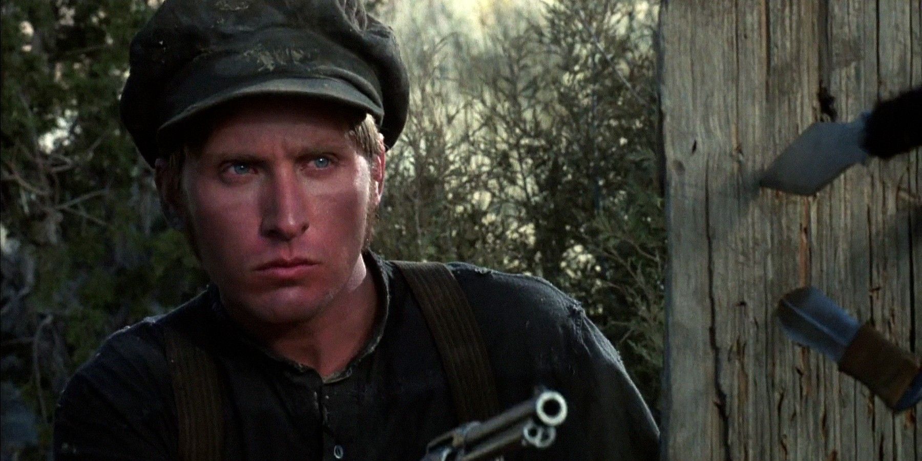 EEmilio Estevez in Young Guns pointing his gun