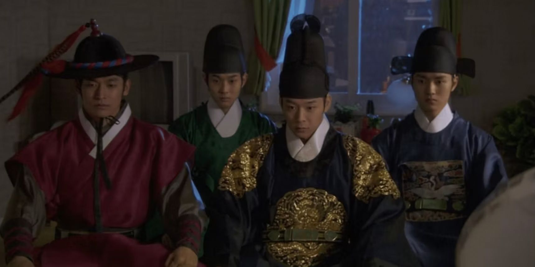 Four men bow their heads in the Korean time travel drama Rooftop Prince