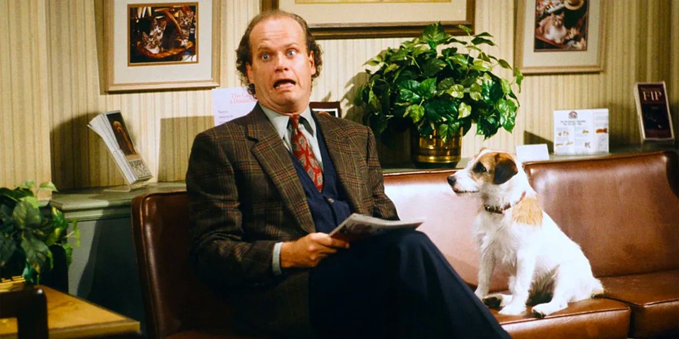 Eddie stares at Frasier as he tries to read in Frasier