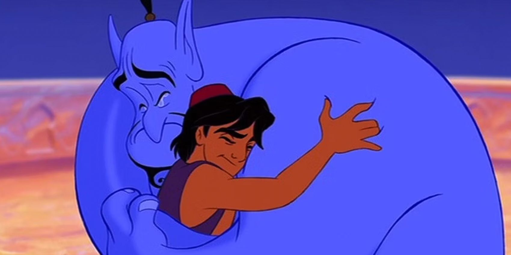 Scott Weinger as Aladdin and Robin Williams as Genie hug in the animated Aladdin
