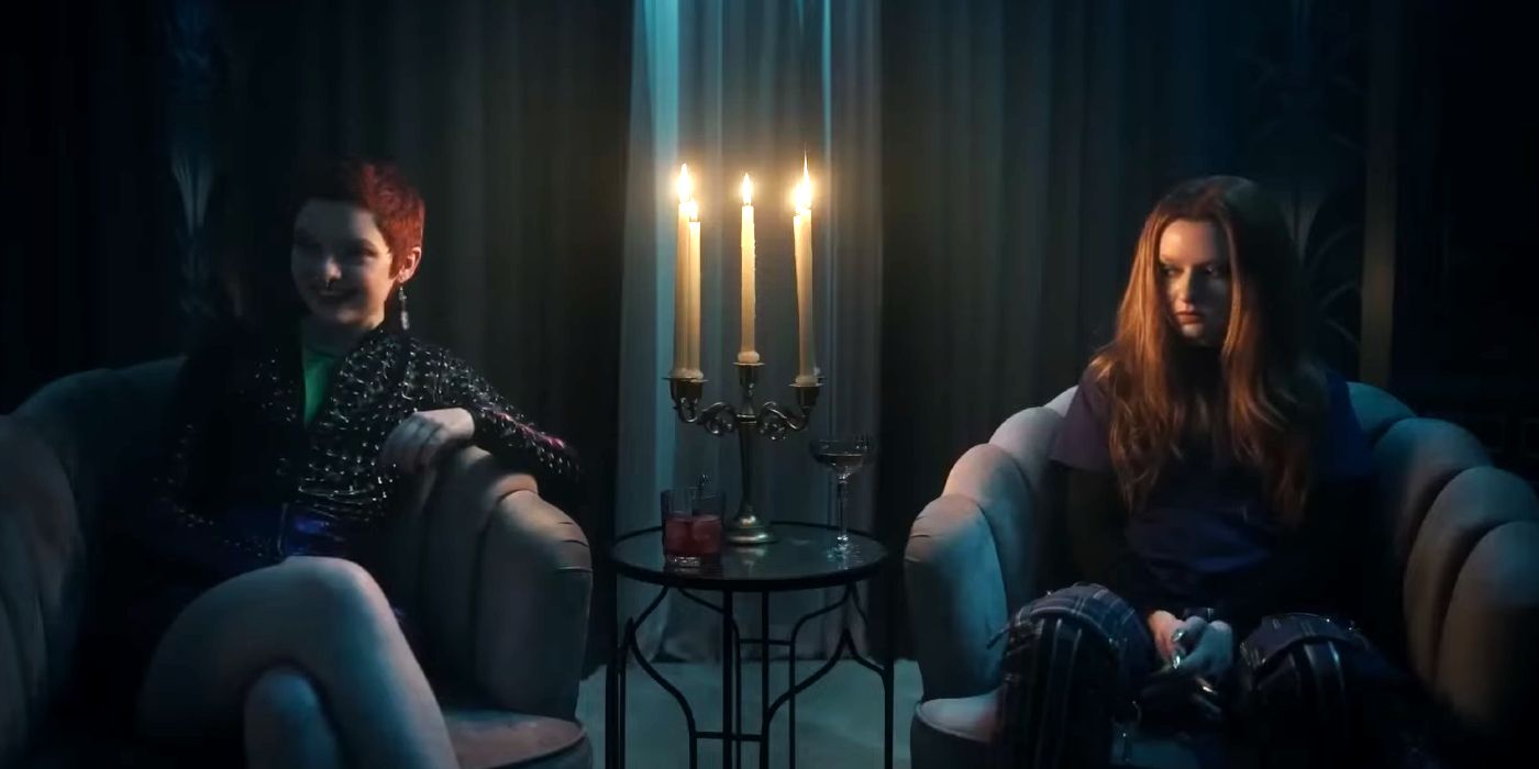 Glenn and Glenda sit in chairs by a candlestick in Chucky.