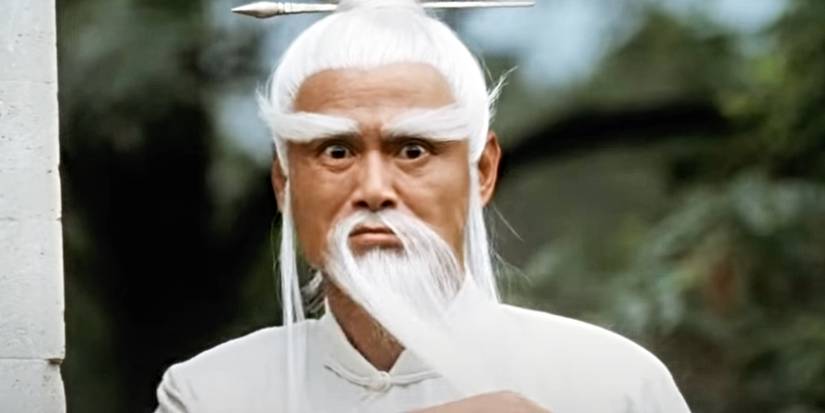 Gordon Liu as Pai Mei strokes his beard after imparting yet another lesson in Kill Bill: Volume 2