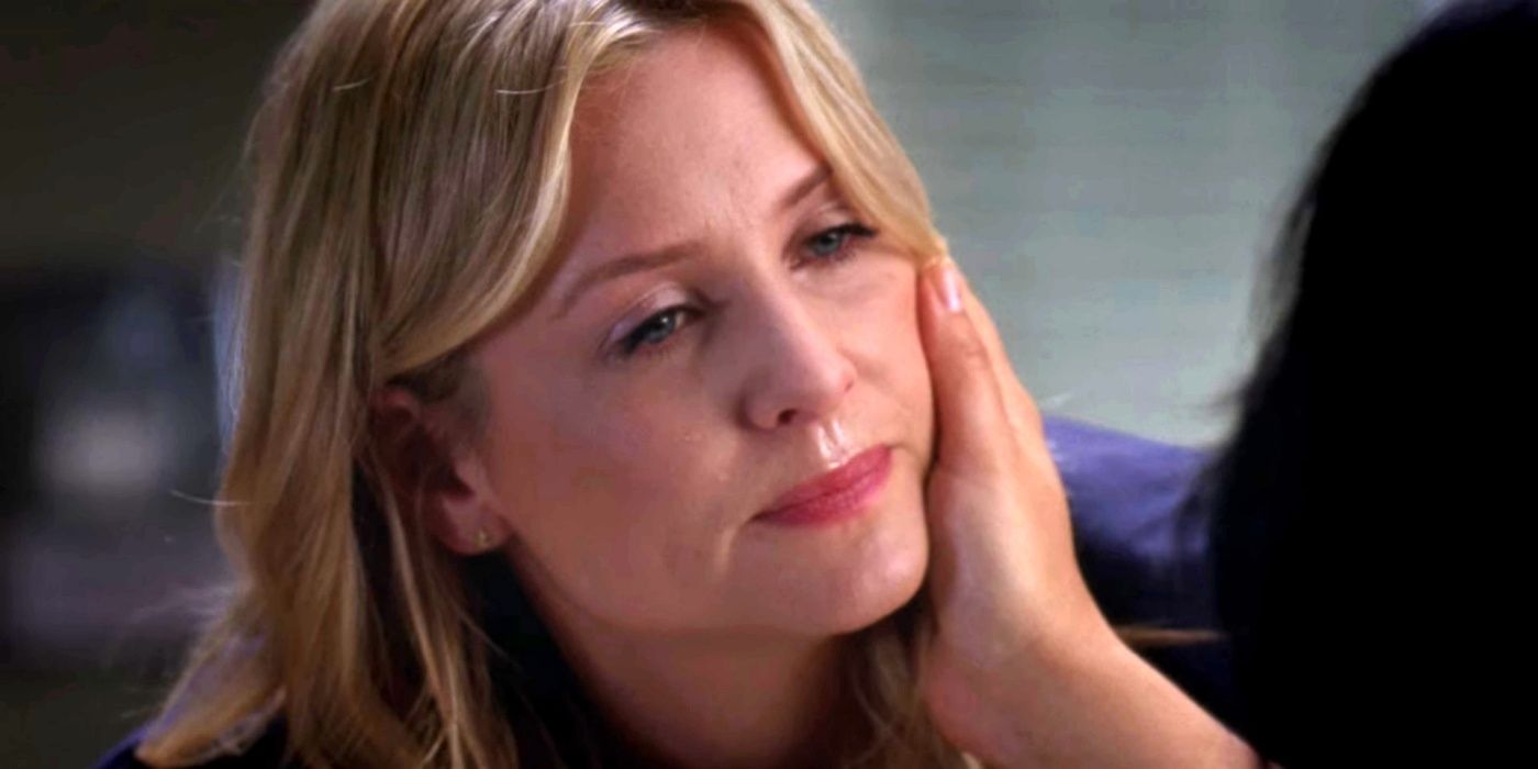 Callie's hand holding Arizona's face in the Grey's Anatomy season 6 finale.