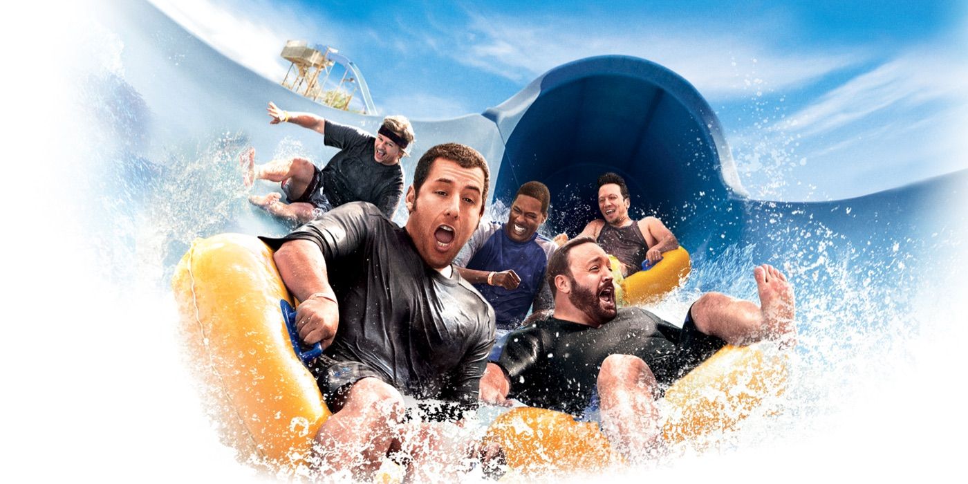 The cast of Grown Ups goes down a water slide 