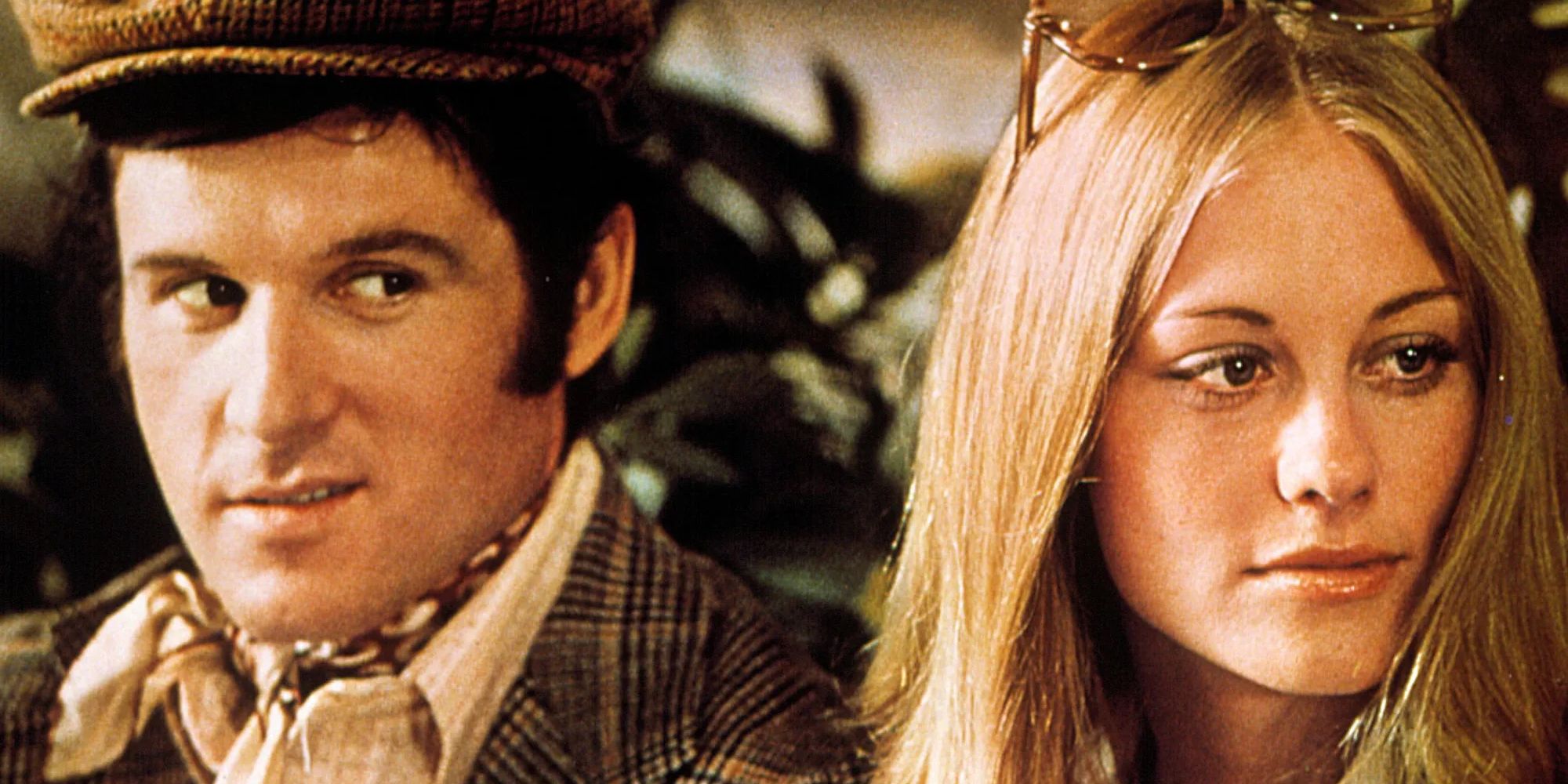 Charles Grodin side-eyeing Cybill Shepherd, who is looking away, in The Heartbreak Kid (1972).