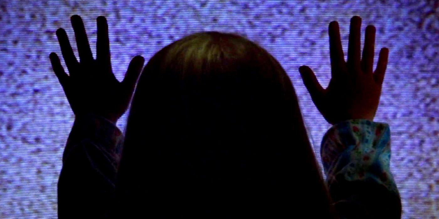 Heather O’Rourke as Carol Ann Freeling with Her Hands on the TV in Poltergeist