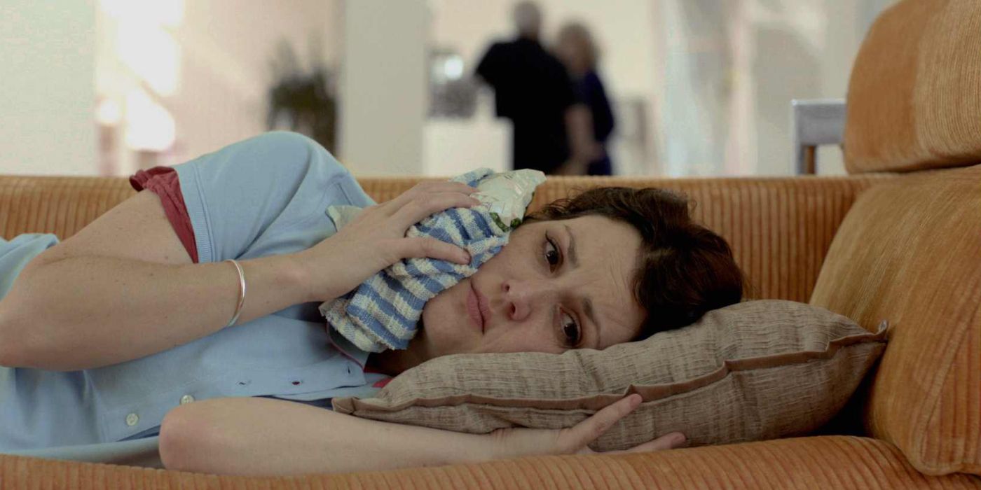 Melanie Lynskey lying on a couch in Hello I Must Be Going