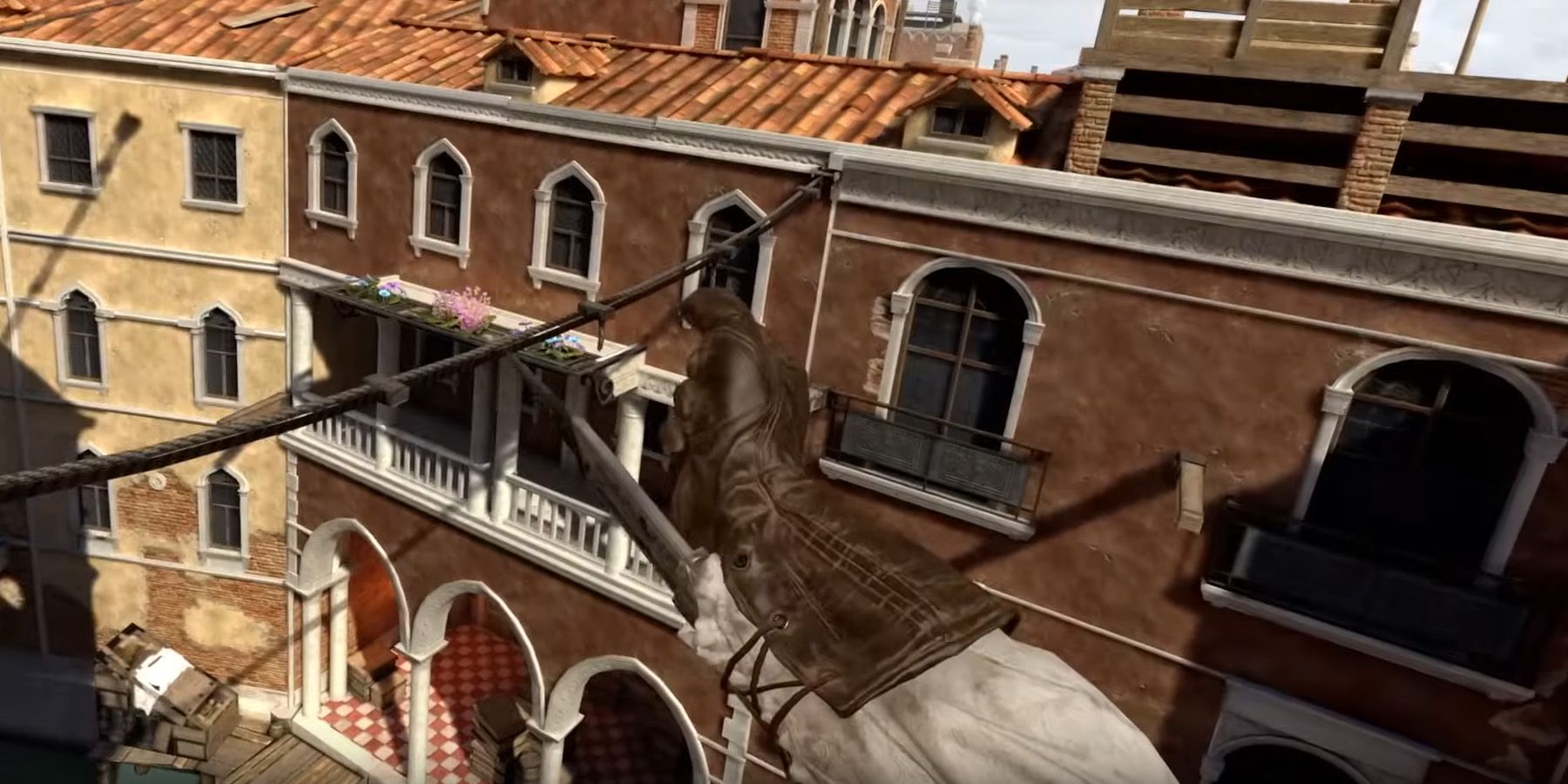 Ezio flicking out a hidden blade from a first-person perspective in Asassin&rsquo;s Creed Nexus VR.