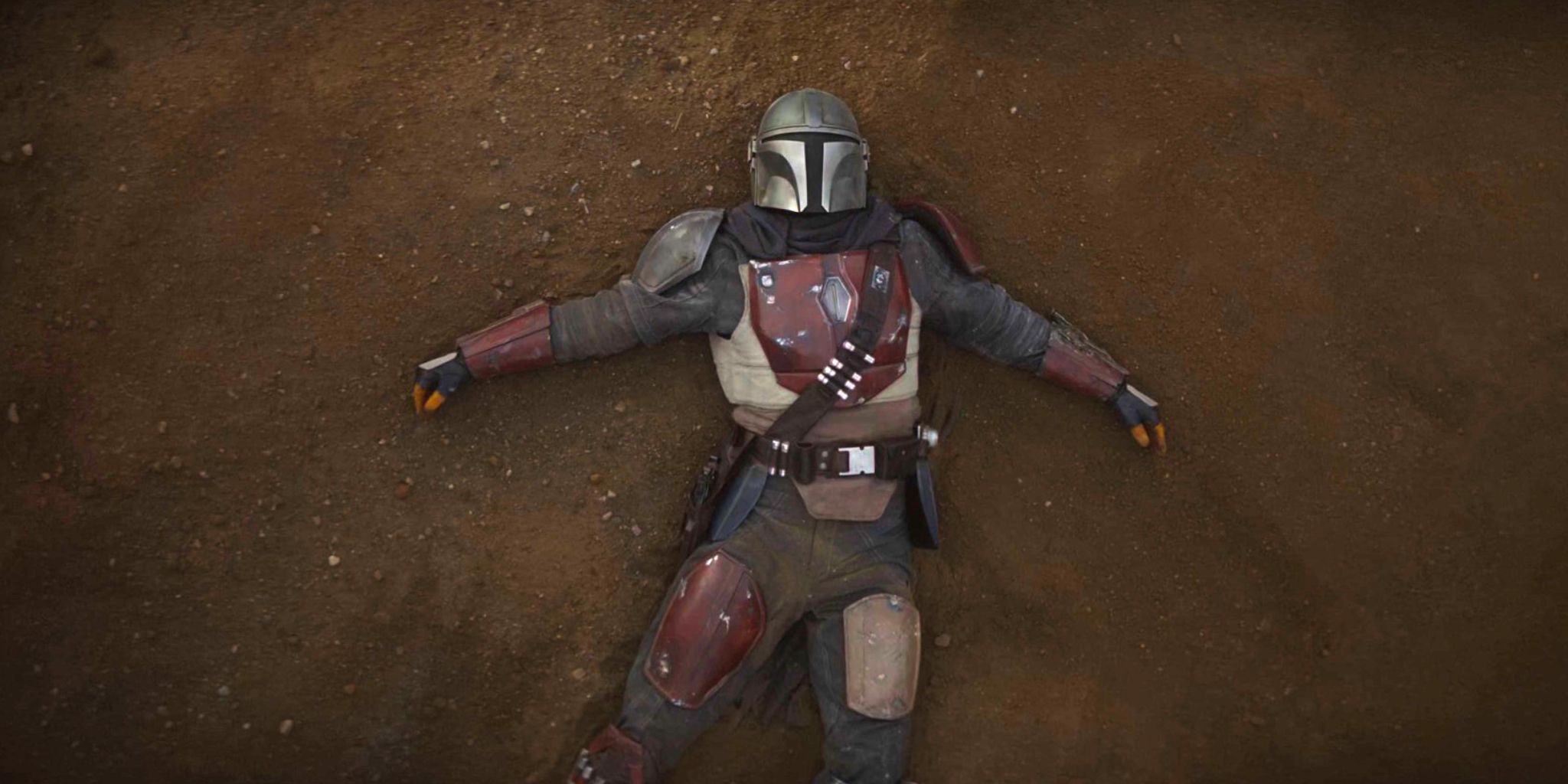 Din Djarin unconscious after falling from the Jawa Crawling Fortress in The Mandalorian