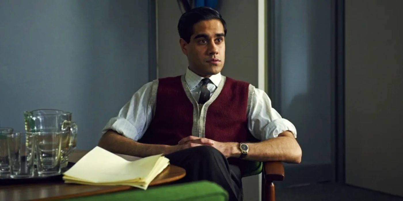 Waris Hussein sitting at a desk in An Adventure in Space and Time