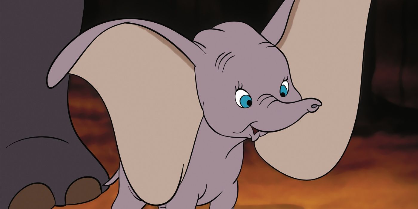 Dumbo with his ears and trunk perked up.