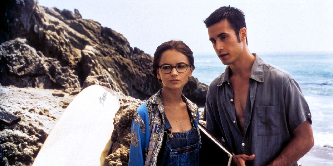 Zach and Laney by the rocks at the beach in She's All That.