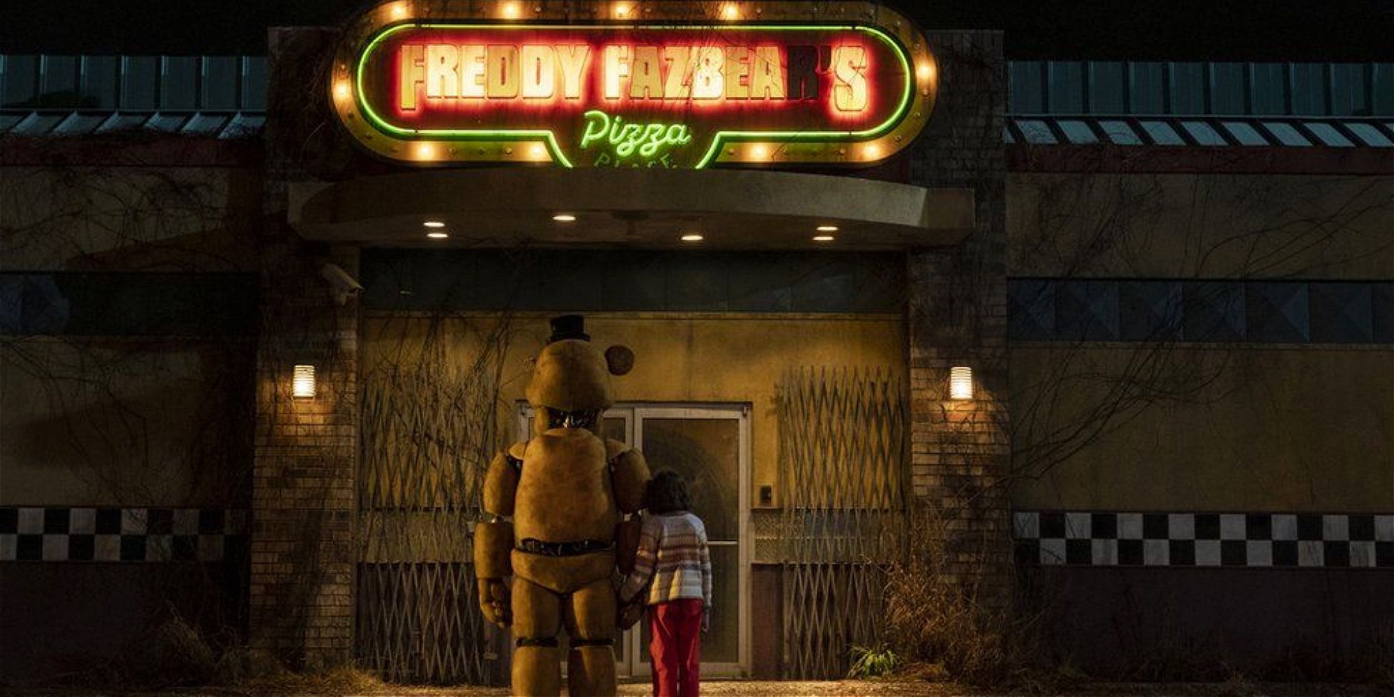 Abby and Freddy stand outside Freddy Fazbear's Pizza in Five Nights at Freddy's.