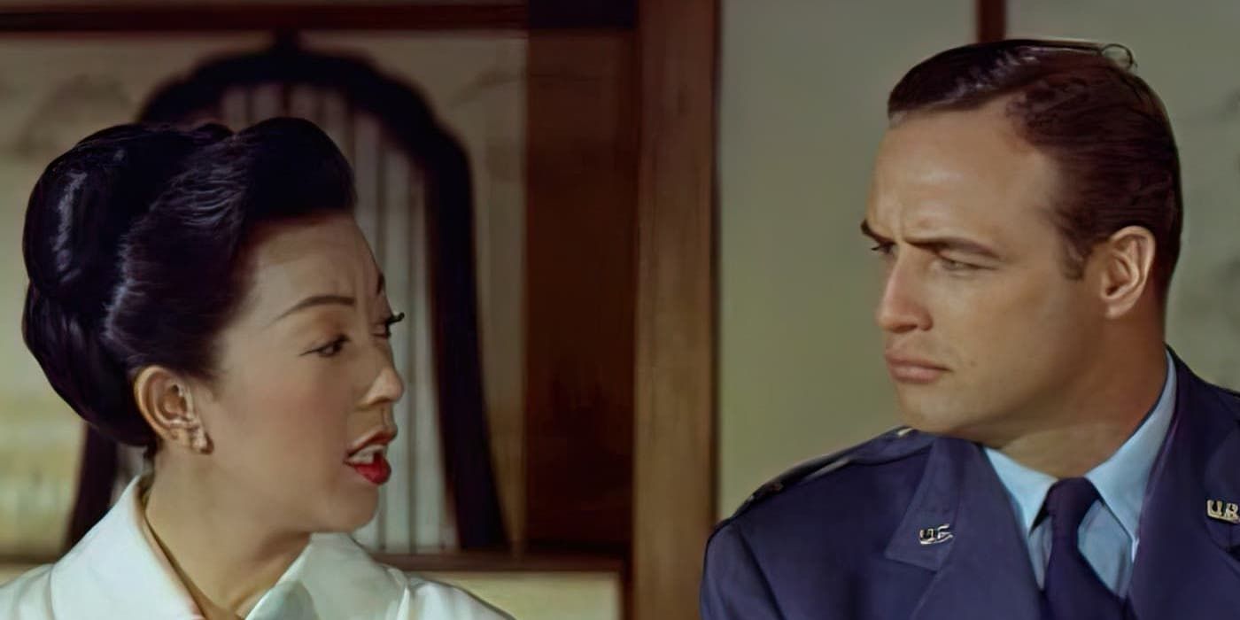 Marlon Brando and Miiko Taka looking at each other in Sayonara.