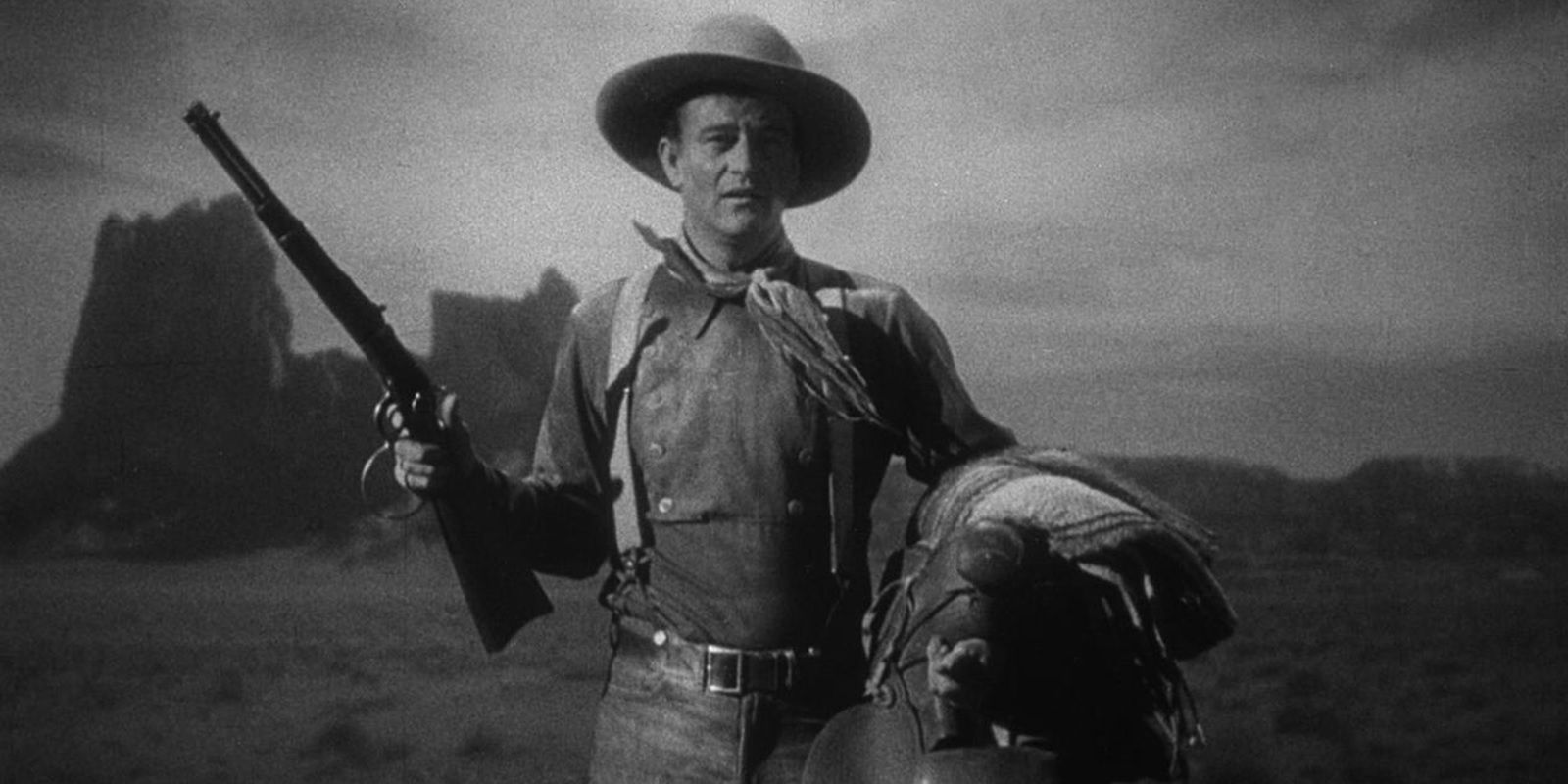 John Wayne with a rifle in Stagecoach
