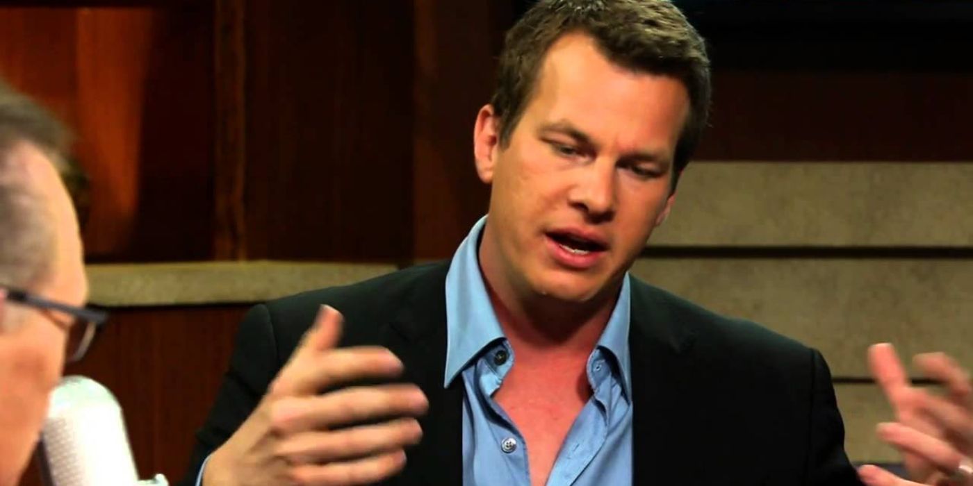 Jonathan Nolan explaining something to Larry King