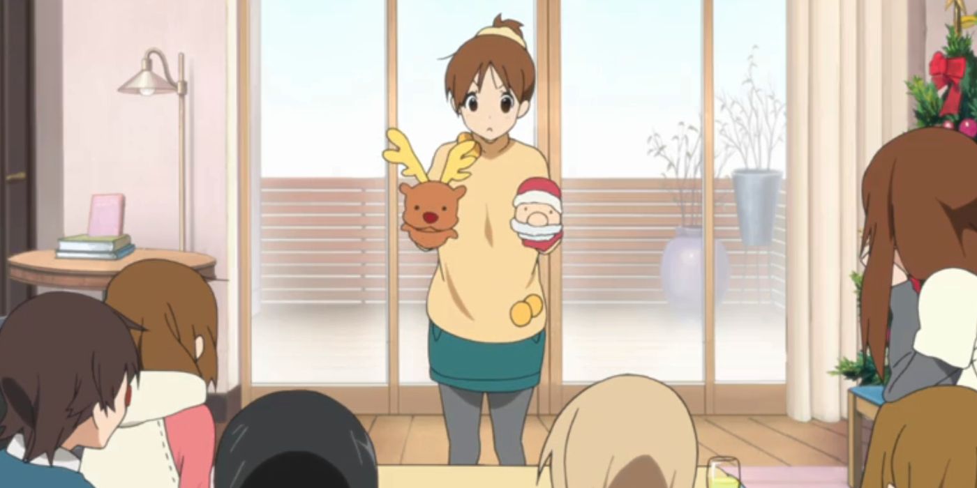 K-On Christmas everyone gathers around Sawako with christmas mugs