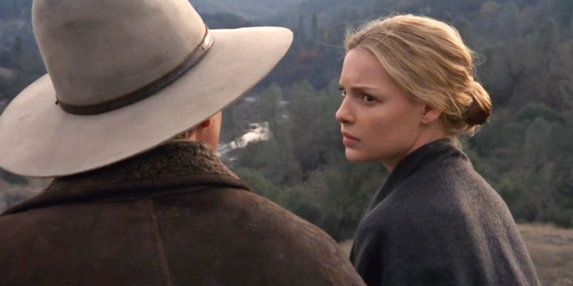 Katherine Heigl talking to a man in a cowboy hat in Love Comes Softly