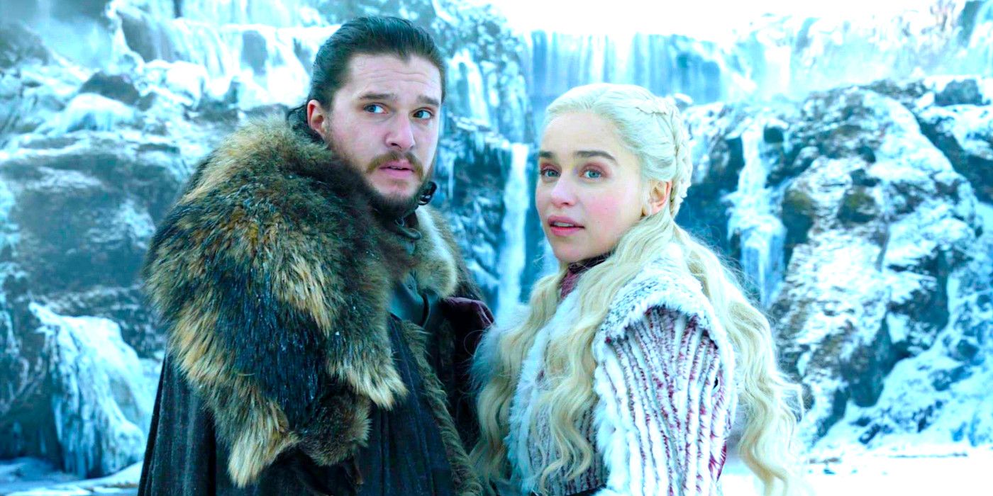 Kit Harington and Emilia Clarke as Jon Snow and Daenerys Targaryen standing together looking surprised in Game of Thrones