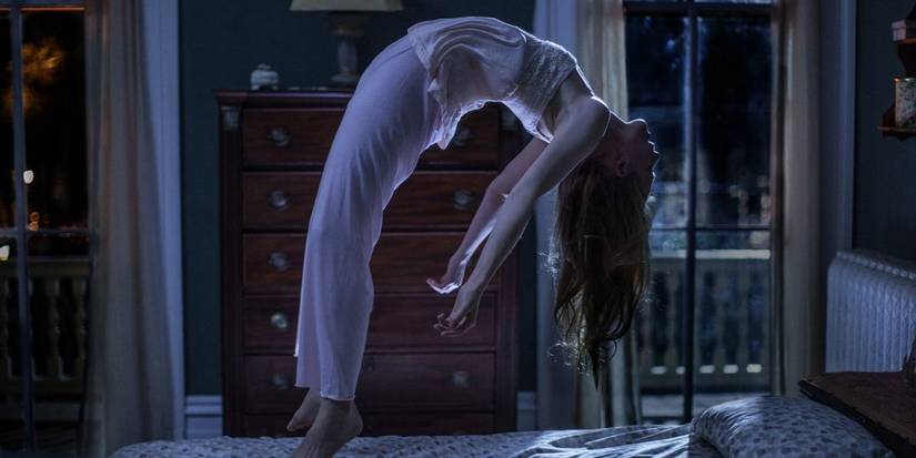 Nell floating over her bed in Last Exorcism Part 2.