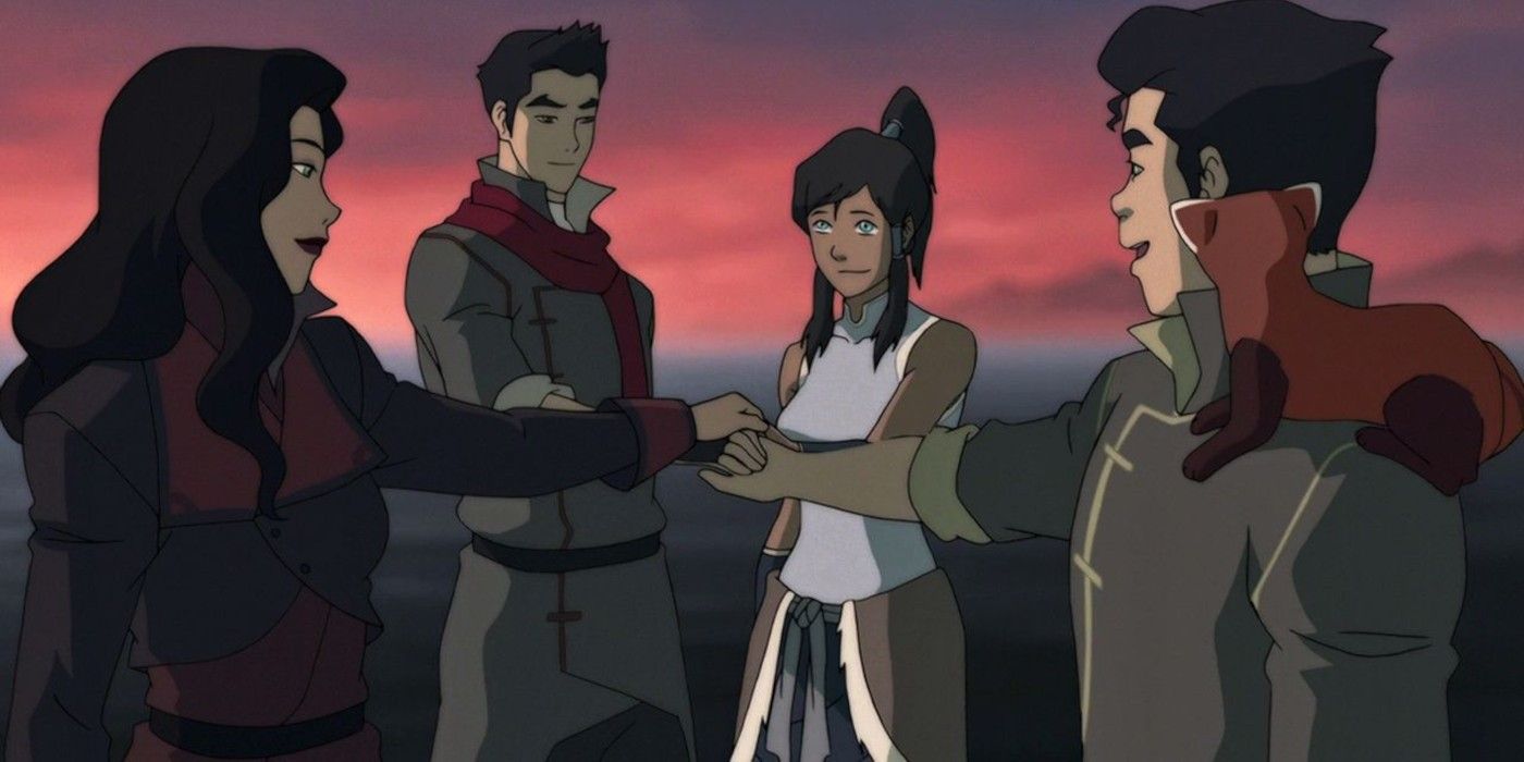 Team Avatar touching hands in a circle in The Legend of Korra