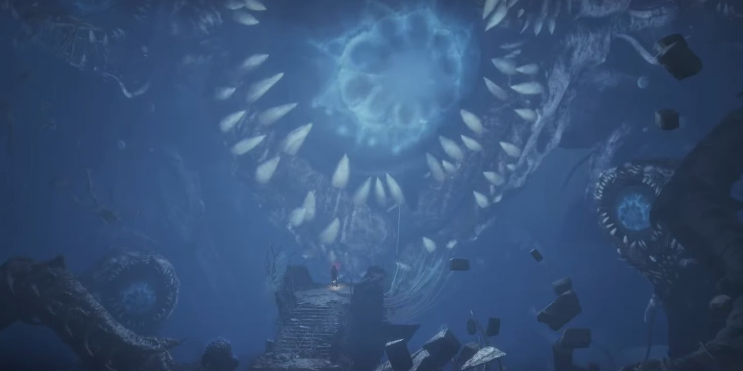 The player character is dwarfed by a giant enemy, made up of glowing blue eyes and teeth, in a screenshot from Lords of the Fallen.
